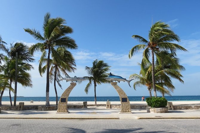 Catamaran Tour to Isla Mujeres, Open bar, Lunch, Snorkeling, Beach Club Included - Free Time on Isla Mujeres Without a Guide