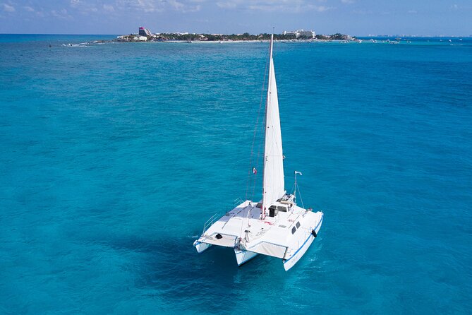 Catamaran with Snorkeling and North Beach, Isla Mujeres - Returning to Cancun with a family-style crew