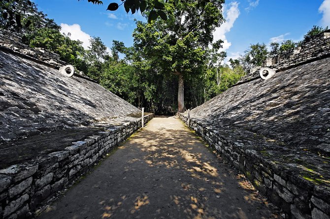 Chichen Itza, Coba & Cenote with optional Lunch & Hotel Pick-up - The cenote stop: cool water and a built-up setting