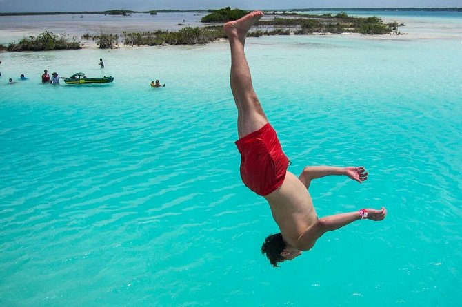 Colorful BACALAR. Incredible Pontoon Tour in one day from Cancun or Riviera Maya - San Felipe’s Fort and a local lunch