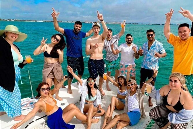 Deluxe Catamaran to Isla Mujeres, with Drinks, Snorkel & Buffet - The beach club buffet after the island stop