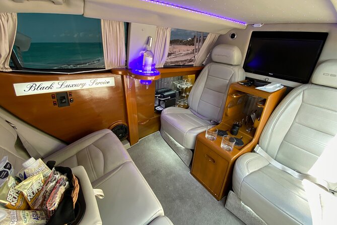 Deluxe GMC Limousine from CUN Airport to Playa Mujeres - Wi-Fi, entertainment, and the one comfort detail to check