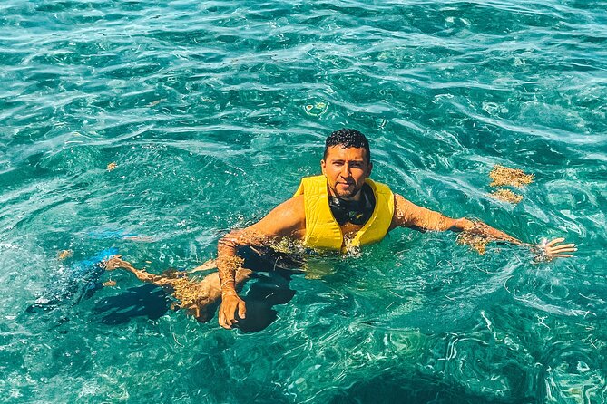 Drive an Speedboat + Mayan Ritual + Food Tasting and More! - Snorkeling Among Fish and Coral