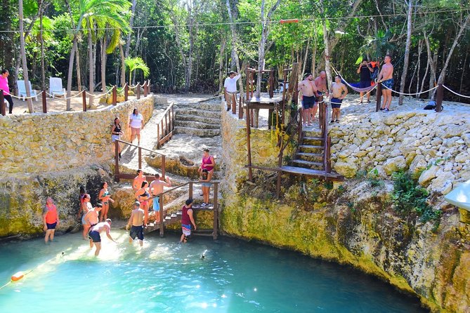 Experience ATV (shared) Ziplines & Cenote with Lunch from Cancún - A cool cenote swim after the action
