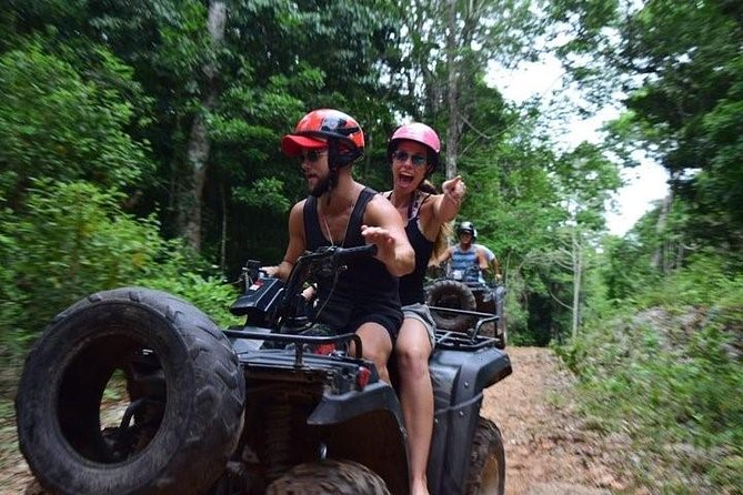 Experience ATV (shared) Ziplines & Cenote with Lunch from Cancún - ATV time on cobbled roads and obstacles