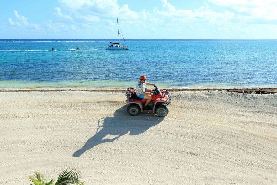 From Cancún: ATV Jungle Trail Adventure and Beach Club - Mud, trees, and changing speeds on the jungle trail