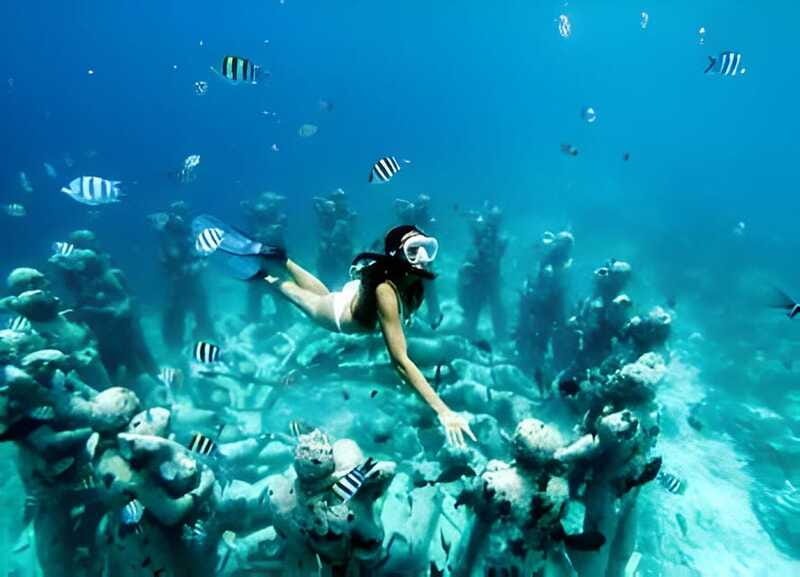 From Cancun: Isla Mujeres by Luxury Catamaran with Drinks - Playa Norte: 75 Minutes for Photos and Free Time
