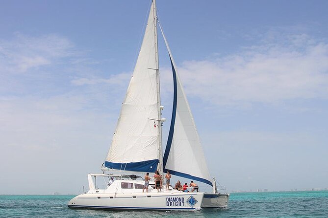 Full-Day Luxurious Catamaran Adventure - Cancún to Isla Mujeres - Snorkeling in crowded Caribbean water