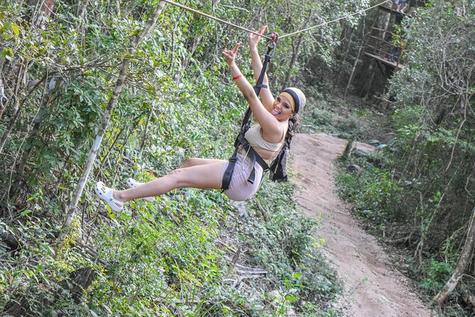 Half Day in Cancun Atvs Ziplines and Cenote Park - Zip lines, hanging bridges, and a little nerve