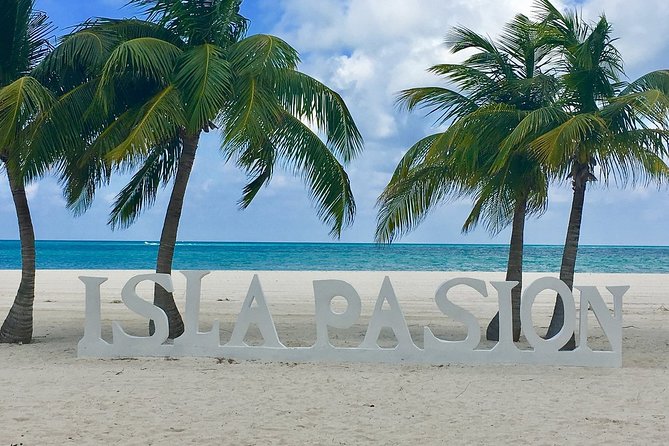 Holbox and Passion Island Full-Day Tour with Cenote, Transportation and Lunch - Holbox Island: lunch, streets, and free time