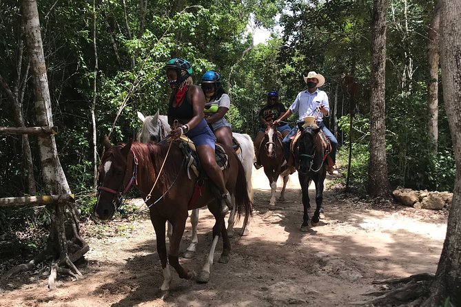 Horseback riding and ATV in the jungle, Ziplines, Cenote & Lunch - Ziplining above the jungle