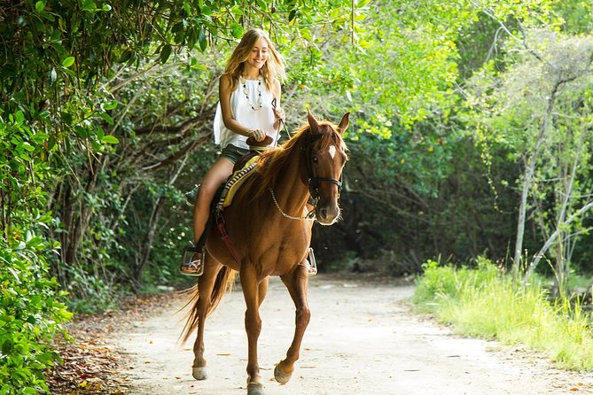 Horseback Riding + ATV + Cenote + Zip-Line from Cancun and Playa del Carmen - Horseback riding through the ranch and jungle