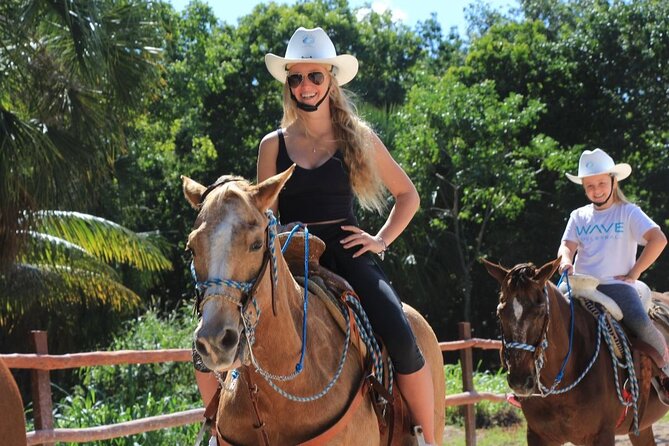 Horseback Riding Tour at Rancho Bonanza and Cenote Swim - Meeting the horses before mounting
