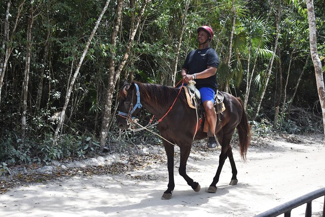 Horseback riding Tour with ATV circuit, ziplines and Cenote - From Cancun to the Puerto Morelos park