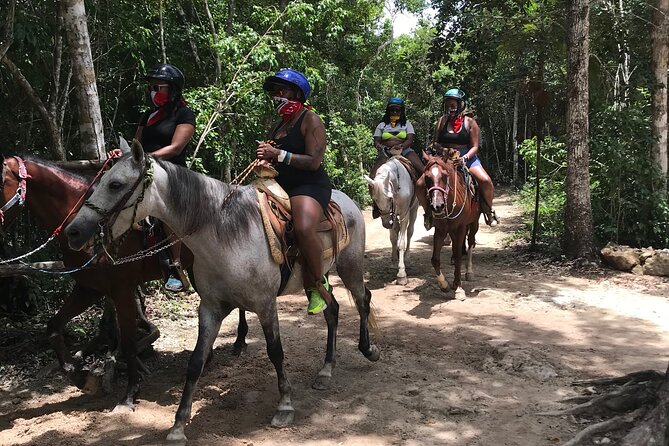 Horseback riding with ATV, zip lines and cenote, lunch and transfer - What this $60.75 day really offers