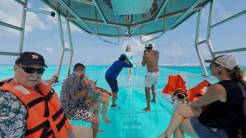 Isla Mujeres: 100% Transparent boat ride - What you can see through the transparent boat