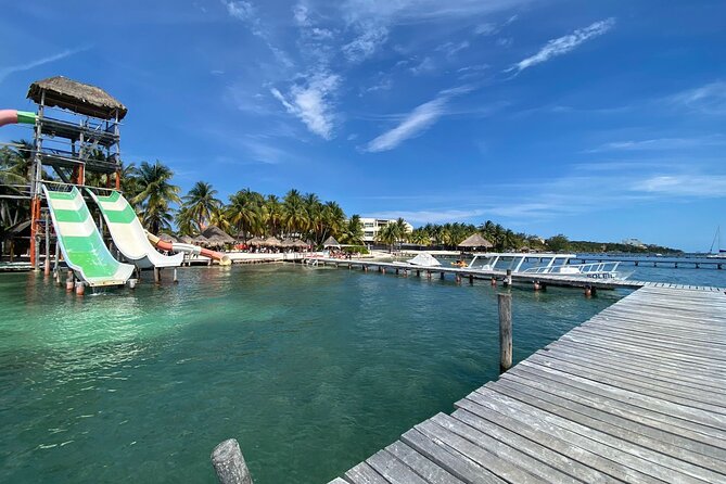 Isla Mujeres Basic Catamaran Tour with Snorkeling and Open Bar - Weather, Cancellations, and Communication