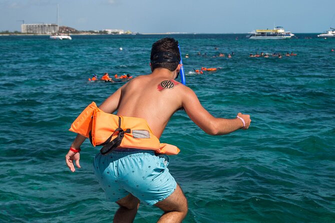Isla Mujeres Catamaran from Cancun with Open bar and lunch - Buffet lunch at the beach club