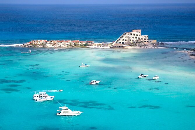 Isla Mujeres Catamaran Luxury Sailing Experience from Puerto Morelos - Playa Norte, beautiful water and a crowded shore