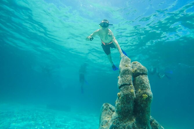 Isla Mujeres Catamaran Luxury Sailing Experience from Puerto Morelos - Calle Hidalgo and downtown island time