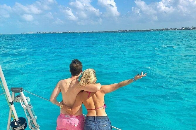 Isla Mujeres Catamaran Tour with Snorkel, Open bar and Transport - Returning by catamaran