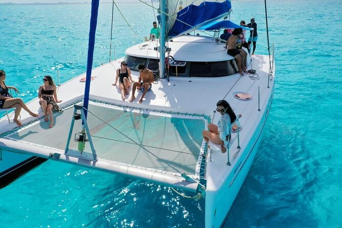 Isla Mujeres: Catamaran Tour with Snorkeling Food, Drinks, Beach - Isla Mujeres town in one hour