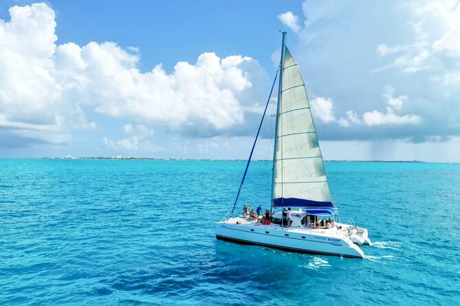 Isla Mujeres: Catamaran Tour with Snorkeling Food, Drinks, Beach - Beach club time, buffet food, and the second open bar