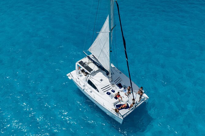Isla Mujeres Day Tour with Catamaran, Snorkeling & Beach Club - Sailing away from Cancun at Marina Las Perlas