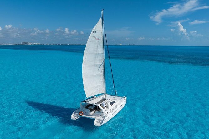 Isla Mujeres Day Tour with Catamaran, Snorkeling & Beach Club - The Bahia Mujeres snorkeling stop