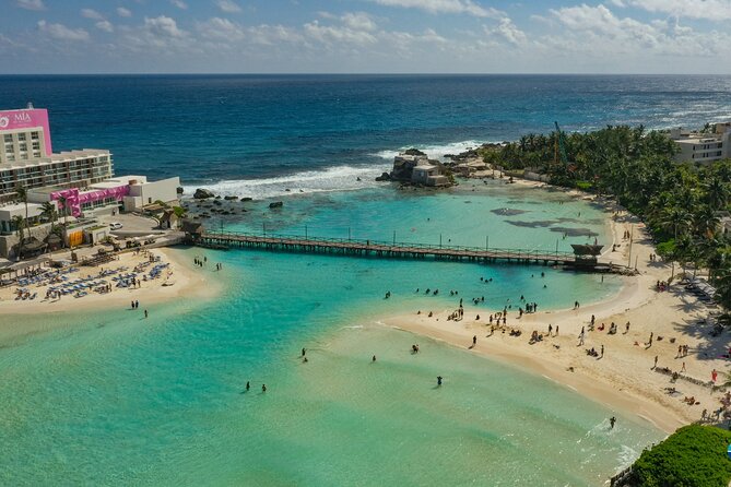 Isla Mujeres Island and Snorkeling Tour - Cruising past Punta Sur and reaching the beach club