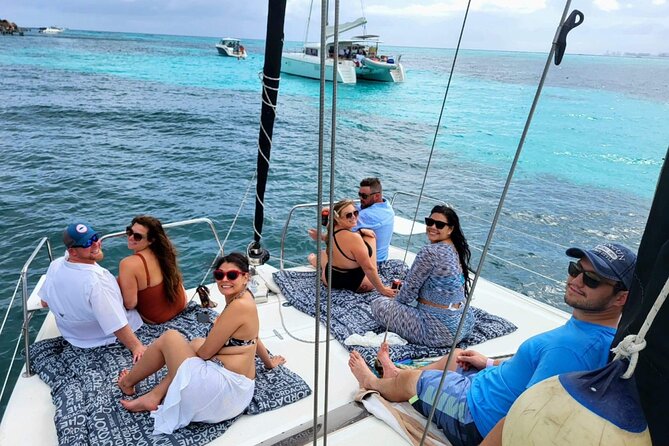 Isla Mujeres Private Catamaran, Cruising, Snorkeling having Fun!! - Kin Ha brings the easygoing swim break