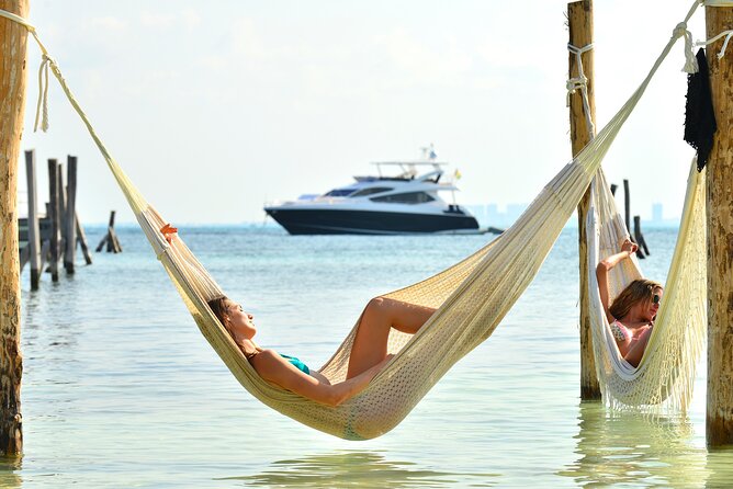 Isla Mujeres Snorkeling & Catamaran Adventure Tour - Drinks, music, and the feel of the boat