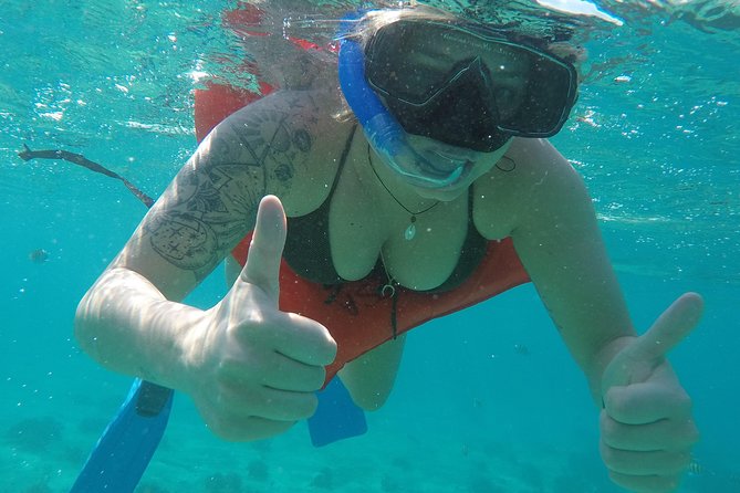 Isla Mujeres Snorkeling Tour Adventure - MUSA adds statues, cars, and a strange underwater setting