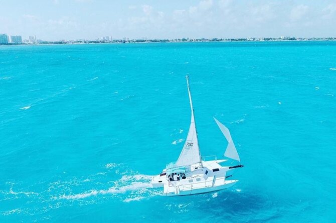 Isla Mujeres Tour in Private Catamaran with Snorkel and Lunch - Snorkeling at Arrecife El Meco