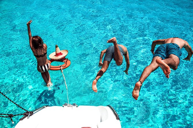 Isla Mujeres Tour on Catamaran with Snorkel, Open Bar, Buffet & Beach club - Snorkeling at El Meco Reef, when the sea allows