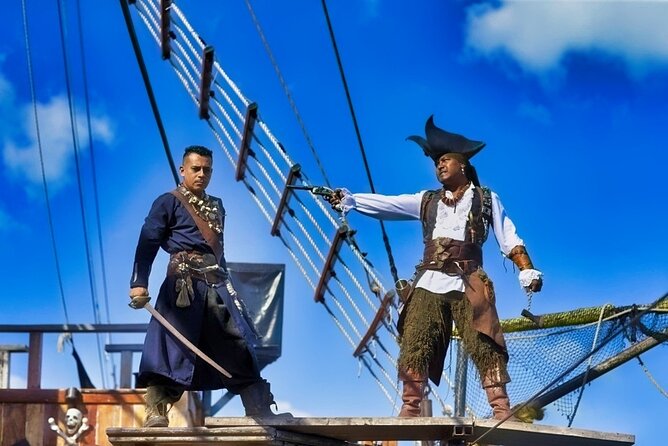 Jolly Roger Pirate Show and Dinner Cruise with Open Bar - Boarding the Jolly Roger at Punta Sam