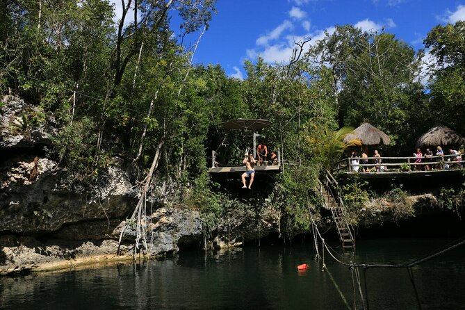 Jungle Adventure from Cancun: ATVs, ziplines, cenote and fun! - Riding ATVs through the Mayan jungle