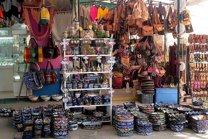 Live the Cancun City Experience! Round Transportation from Cancun - Plaza La Fiesta: tequila, chocolate, and gift shopping