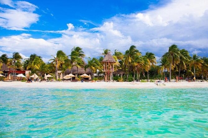 Luxury Catamaran Tour to Isla Mujeres with Transportation - Sailing toward El Meco Reef