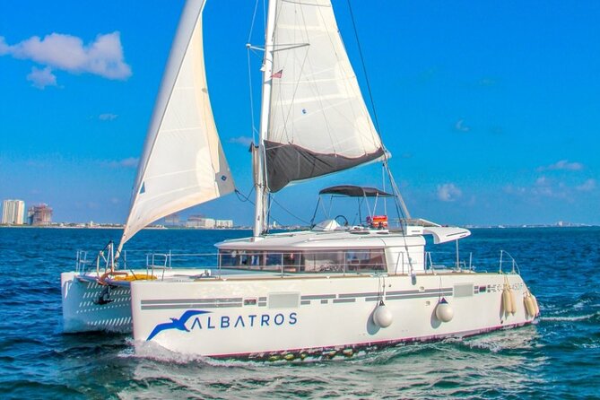 Luxury Catamaran Tour to Isla Mujeres with Transportation - Lunch and water sports at Club Playa Mexico