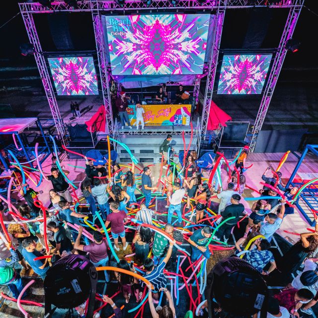 Neon Glow night Beach Party Regular - Fire, dancers, and champagne showers