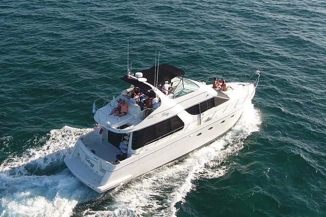 Playa Mujeres rent a Yacht 4hrs with Food and drinks aboard CA55 - Playa Norte gives you time to swim