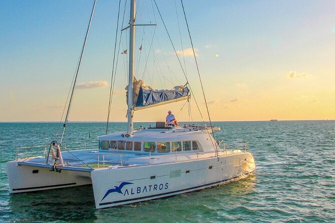 Plus Full Day Catamaran Tour to Isla Mujeres All Inclusive - Sailing south to Punta Sur