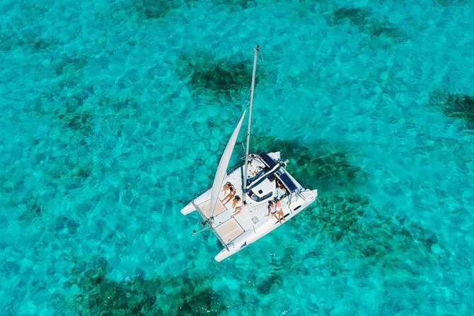 Private Catamaran from Cancun to Isla Mujeres for up to 13 People - Families, celebrations, and group comfort