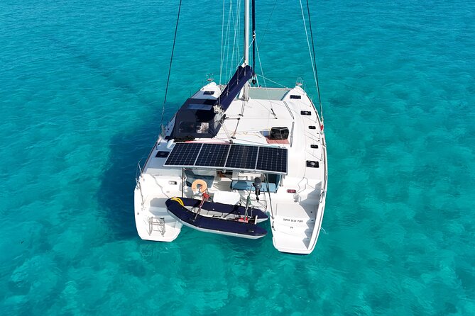 Private Catamaran Tour Super to Isla Mujeres - Drinks, photos, and the sunset question