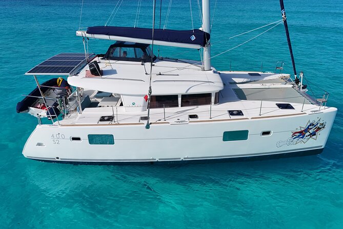 Private Catamaran Tour to Isla Mujeres - El Meco reef, fish, corals, and underwater sculptures