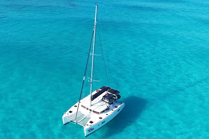Private Catamaran Tour to Isla Mujeres - Beach-club time with a buffet and open bar