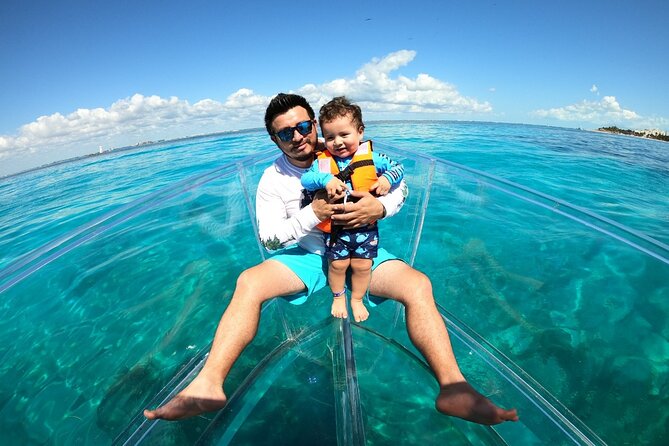 Private Tour Isla Mujeres excursion in Transparent Boat - El Farito and the search for colorful fish