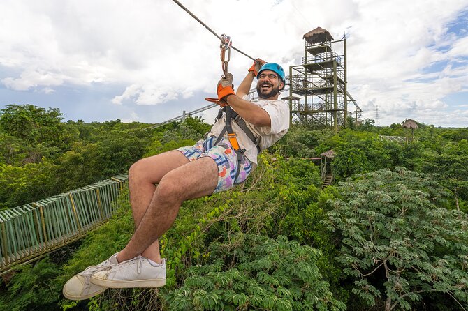 Sky Trail: Sky Bike, Tarzania, Bungee Swing & Zip Line with lunch - Climbing to the 16-meter platform