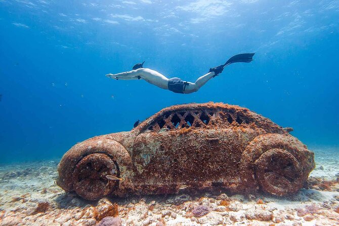 Snorkeling in Isla Mujeres and Underwater Museum - Tikinxic fish lunch at the beach club
